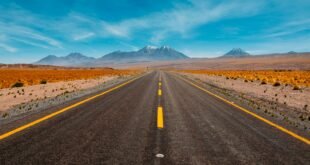 lone road going to mountains