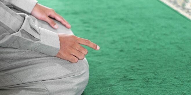 a pair of hands shaking