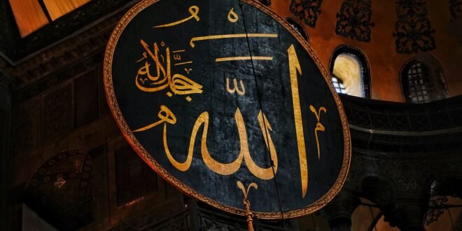 a large sign hanging from the side of a building